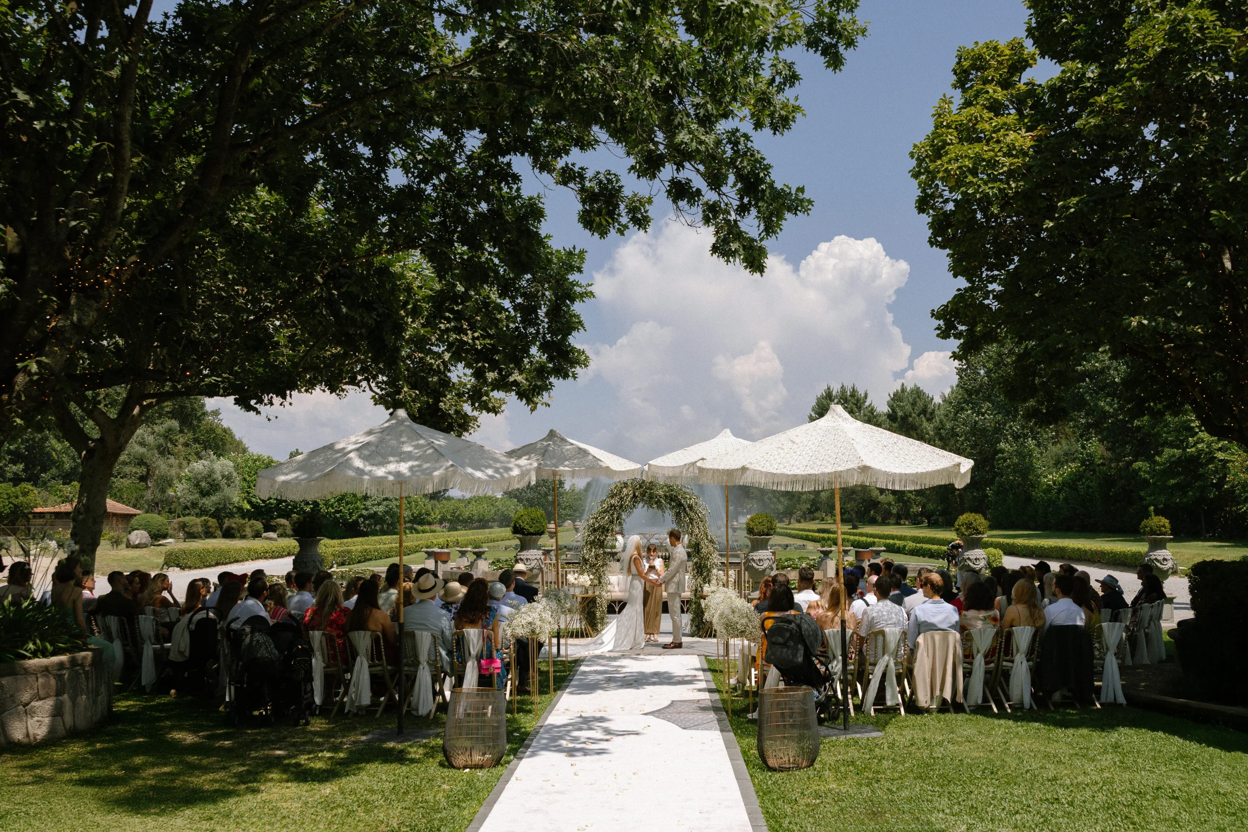 general view of a destination wedding ceremony overlooking the palace gardens in Portugal