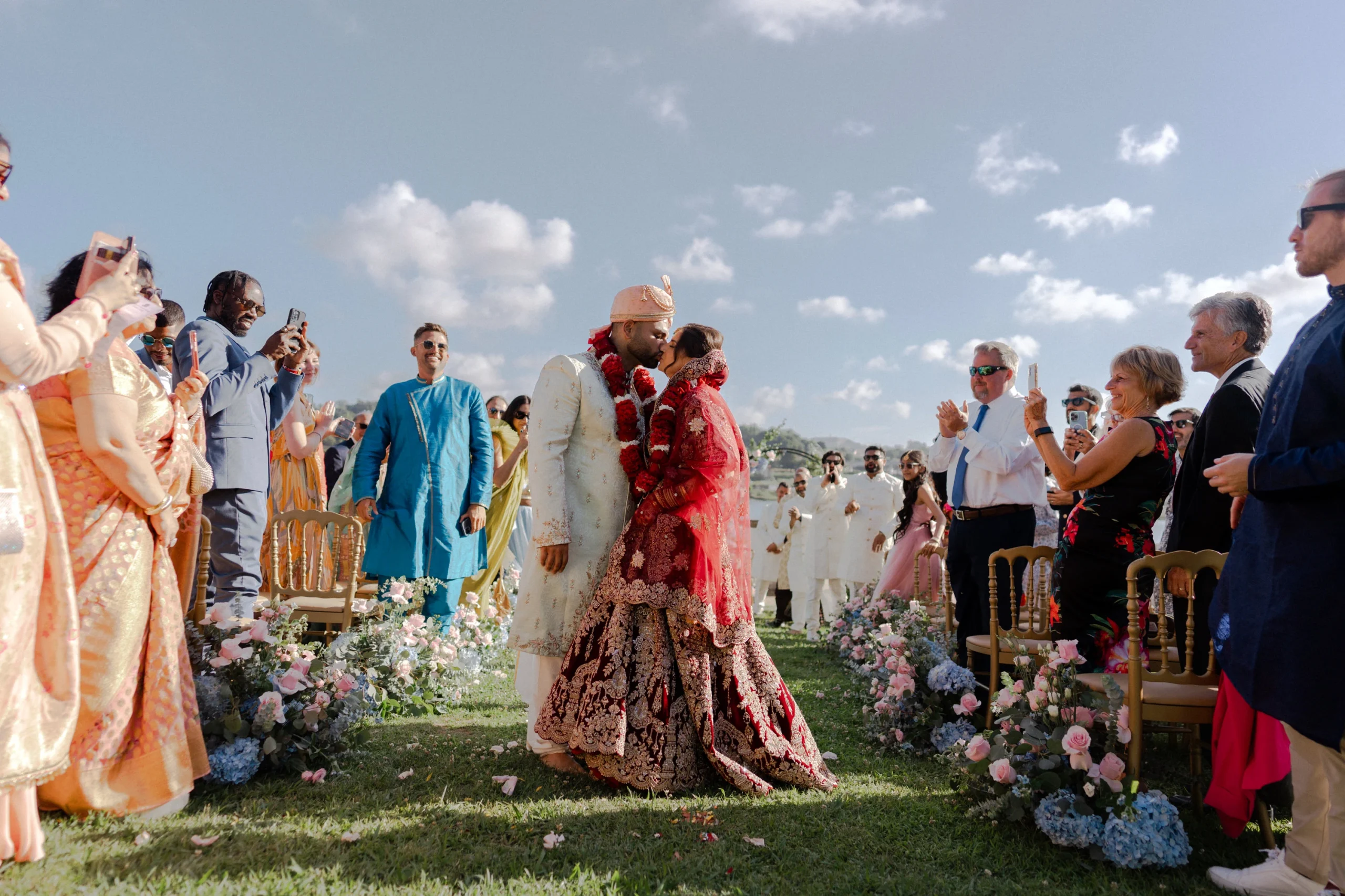 Indian couple celebrating with their guests during a destination wedding in Portugal